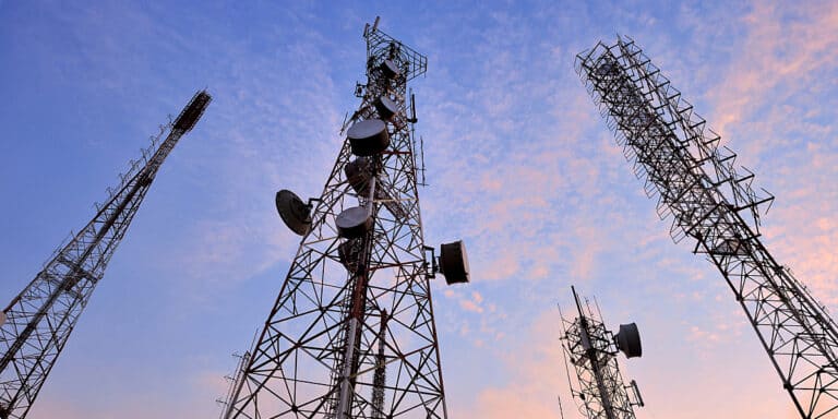 Broadcast towers at sunset