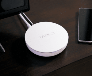 Closeup of the Tablo device on a dark table