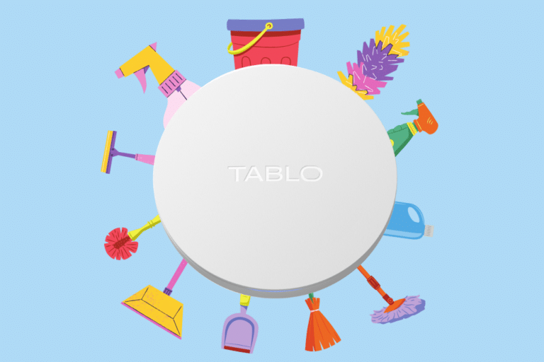 Tablo with cleaning implements sticking out of it.