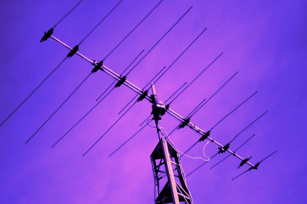 Directional antenna framed by the sky.