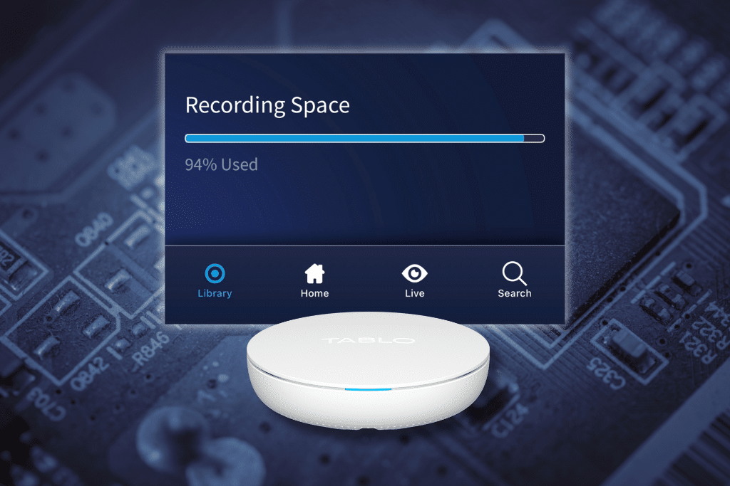 Tablo showing its drive is almost full on a circuit board background.